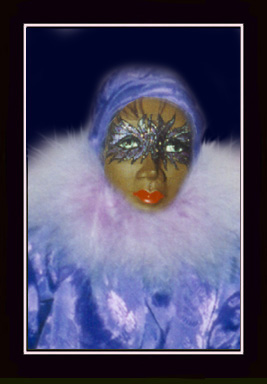 Click here to view closeup of the African American Doll, Naomi, A Mardi Gras Masquerade Doll